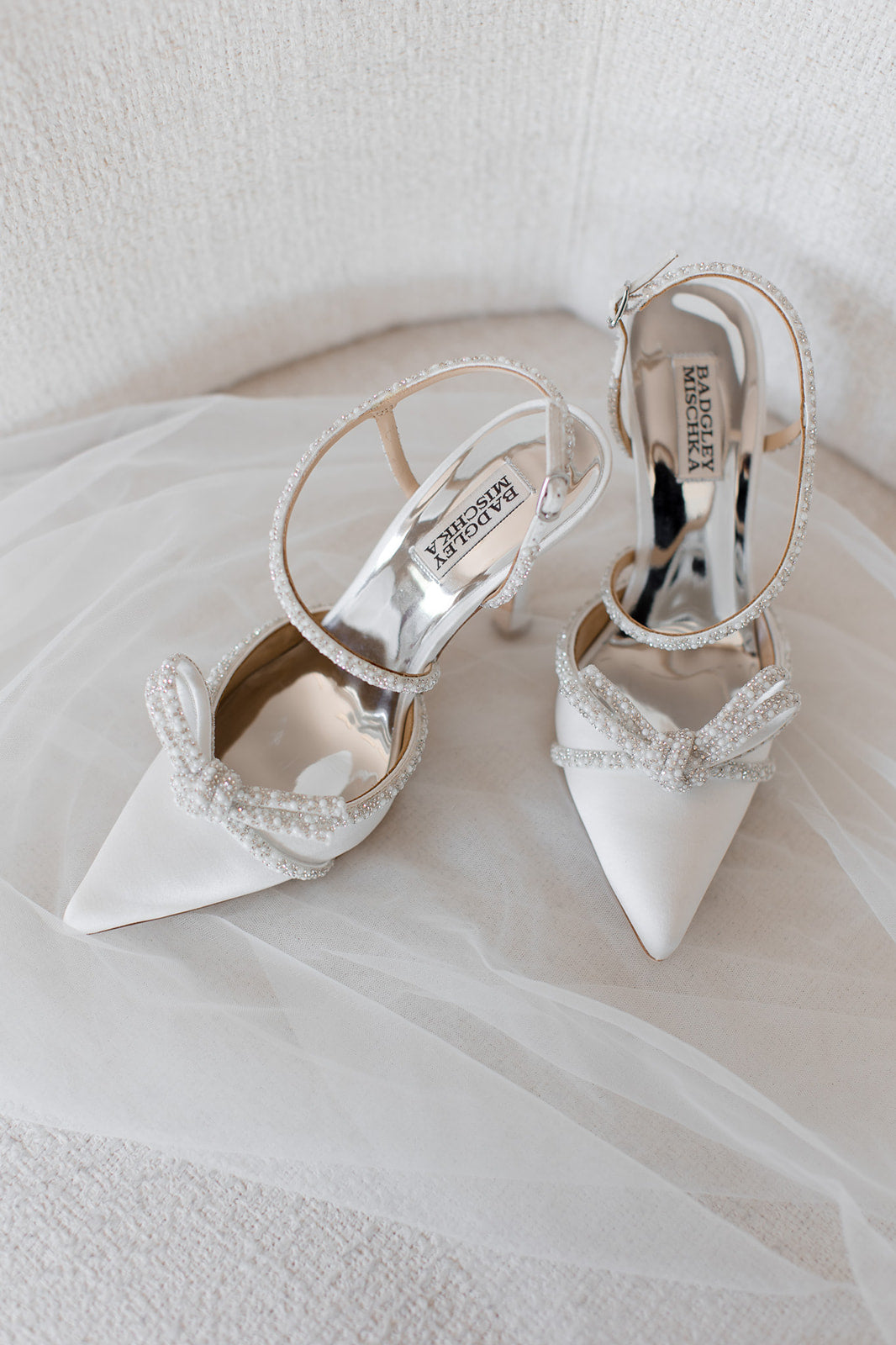 Elaine - Satin Pointed Stiletto Heels With Pearl & Crystal Bow - Soft White