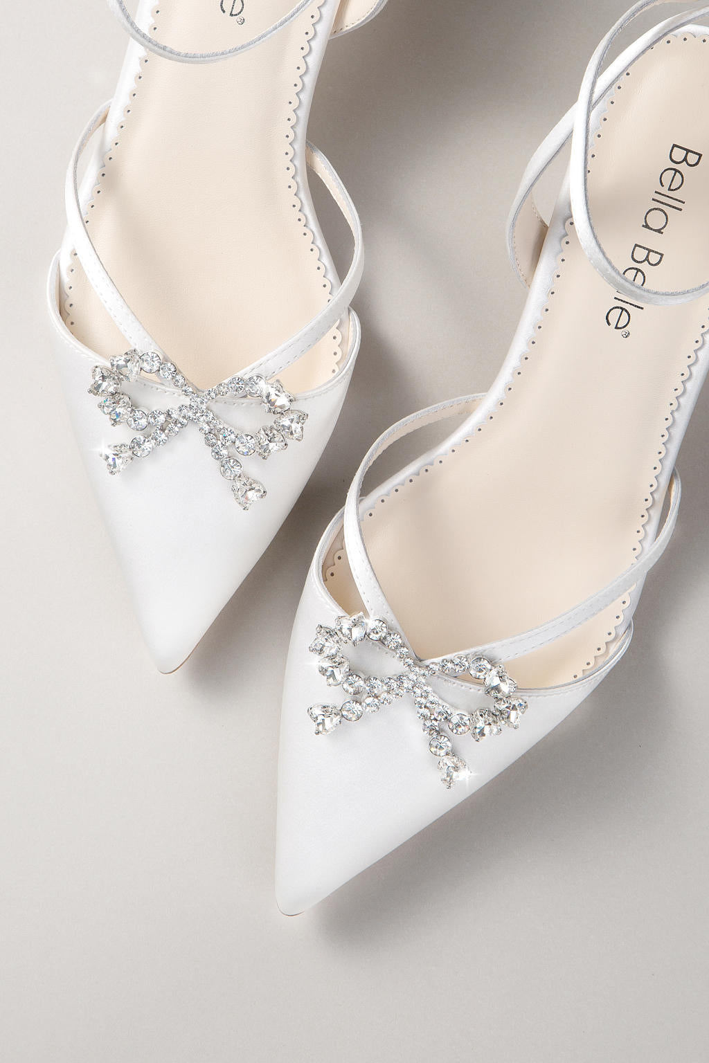 Amira - Pointed Toe Ankle Strap Crystal Bow Heels - Ivory